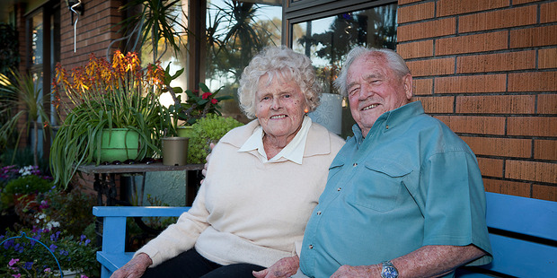 Bill and Barbara Chapman who have lived in the Avenues for 20 years and have no plans to leave. Photo/Andrew Warner