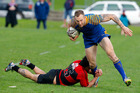 Tauranga Sports centre Byron McGuigan is grabbed by a Whakarewarewa defender in Saturday's semifinal. Photo/Andrew Warner Tauranga Sports centre Byron McGuigan is grabbed by a Whakarewarewa defender in Saturday's semifinal. Photo/Andrew Warner