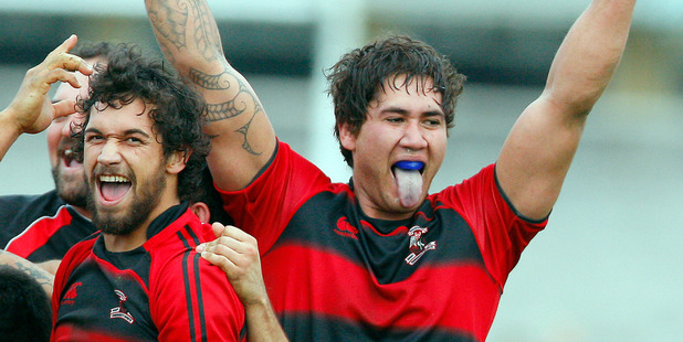 Whakarewarewa first five-eighth Te Rangi Fraser (main picture) fended off Beau Williams as part of a fine all-round display. Whaka's Riiki Waitoa (right) lifts his hands to celebrate on Saturday. Photo/Andrew Warner