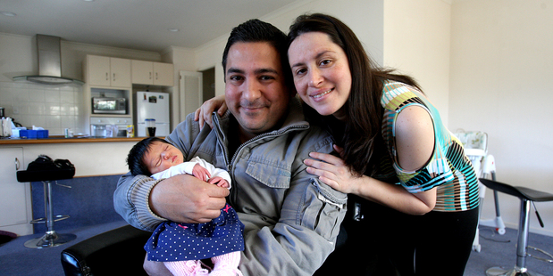 Arturo Fonseca with wife Lizbeth Vera and their baby girl, Sofia. PHOTO/RUTH KEBER