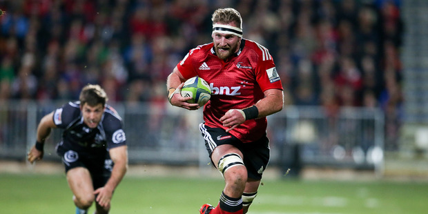 Kieran Read of the Crusaders breaks away from a tackle to score a try during the Super Ruby Semi Final match between the Crusaders and the Sharks at AMI Stadium. Photo/ Getty.