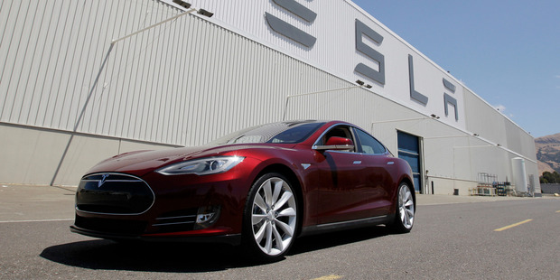 A Tesla Model S outside the California factory. Dealing with Toyota engineers made for a troubled relationship with the Japanese car making giant. Photo / AP