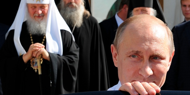 Vladimir Putin, pictured after a meeting with Russian Orthodox Patriarch Kirill, left, fulfilled his presidential promise to "waste" Chechen terrorists. Photo / AP