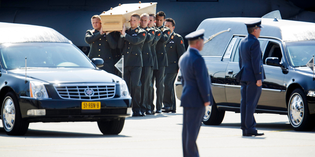 MH17: Bodies still en route to Holland