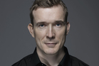 David Mitchell has tightened his writing skills into the 'strait-jacketed' medium of Twitter. David Mitchell has tightened his writing skills into the 'strait-jacketed' medium of Twitter.