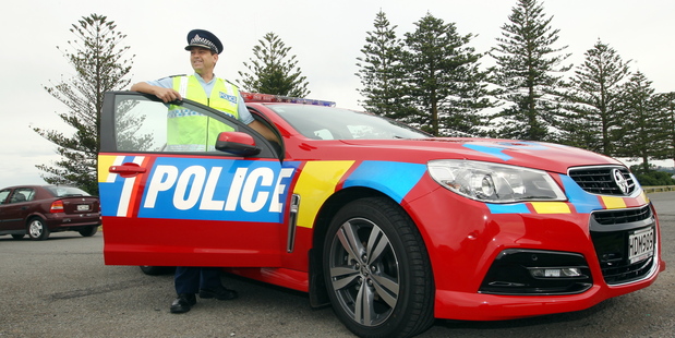 Hawke's Bay Road Policing received three red and orange police cars this week, as part of a national roll-out to increase motorists' awareness of police. Photo / APN