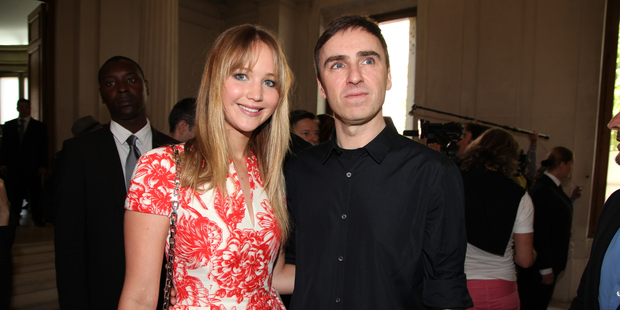 Raf Simons pictured backstage with actress Jennifer Lawrence, following his debut show for Dior in 2012. Picture / Supplied