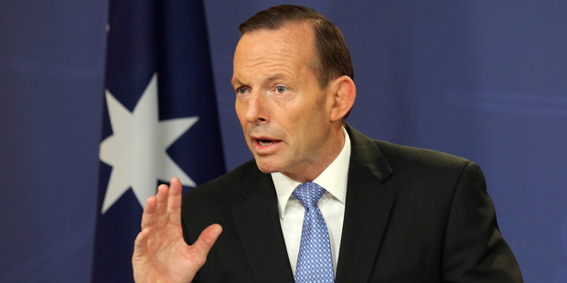 Australia's Prime Minister Tony Abbott speaks during a press conference on the MH17 disaster. Photo / AP