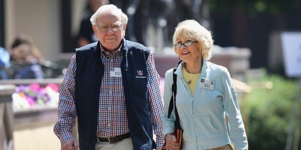 Chairman of Berkshire Hathaway Warren Buffett and his wife Astrid. Warren Buffett could soon have to bid adieu to another of his high-yielding investments from the financial crisis. Photo / AFP