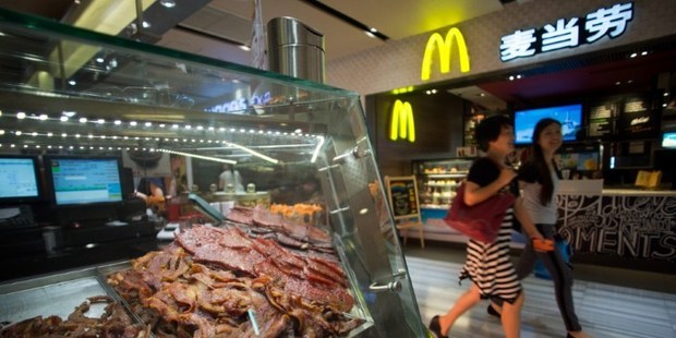 Authorities shut down McDonald's supplier, US-owned Husi Food Company, for mixing expired meat with fresh product. The fast food chain in Hong Kong has suspended sales of several items. Photo / AFP