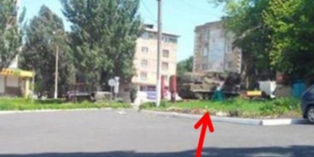 A Russian-made missile system parked in or passing through the rebel-controlled village of Torez, near the crash site.