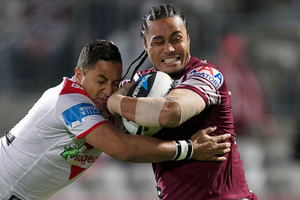 Steve Matai of the Sea Eagles is tackled by Benji Marshall. Photo / Getty Images