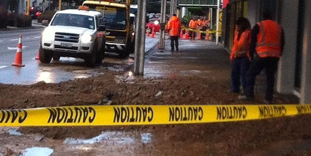 A small sinkhole has opened up on Jervois Quay in Wellington this morning. Photo / Rebecca Quilliam