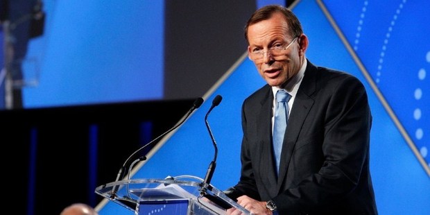 Australian PM Tony Abbott at the B20 Summit in Sydney. To pass laws, Abbott has to win the support of six of the eight lawmakers sitting in the upper house. Photo / AP