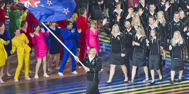Valerie Adams, the New Zealand Flag bearer, leads the New Zealand Commonwealth Games Team into Celtic Football Park. Photo / Greg Bowker