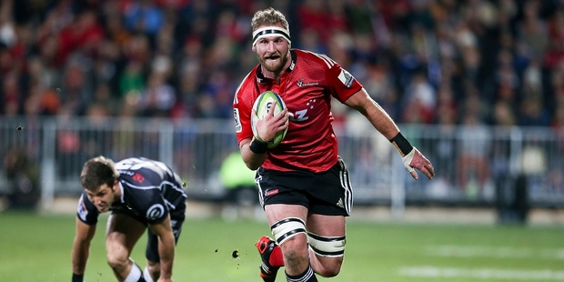 Kieran Read charges in to score for the Crusaders who outplayed the Sharks with their clever running and kicking game in Christchurch. Photo / Getty Images