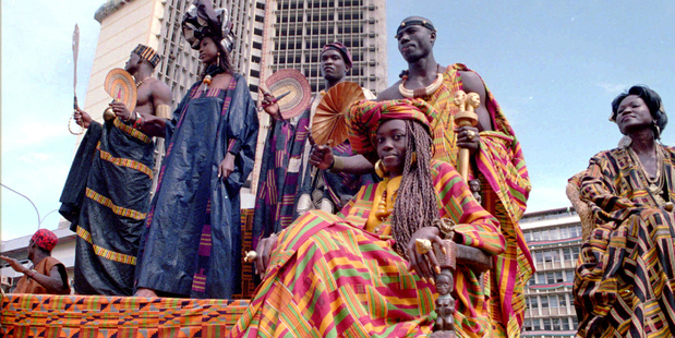 A float carrying models wearing magnificient hand woven clothing from Ghana. Photo / AP Images.