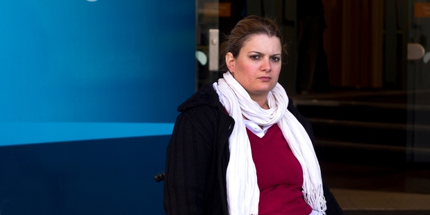 Juliana Carvalho can't get into the new ANZ Bank branch, which lacks wheelchair access. Photo / Dean Purcell