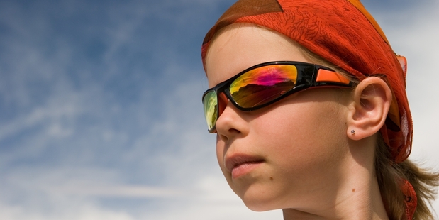 Tinted glasses may help a young child with Irlen Syndrome be able to read letters which otherwise blur, spin or change colour. Photo / Getty Images