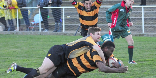 YEAH!: Eketahuna wing Paul Tikomainavalu crashes over for one of two tries, his side were 16-3 down at halftime.