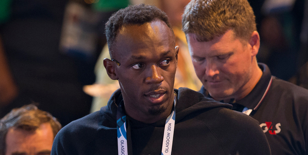 Jamaica's Usain Bolt watches on at the New Zealand-Jamaica netball game in Glasgow. Photo / Greg Bowker