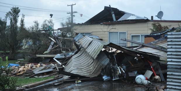 Damage to Marcia Pera's property in the Greymouth suburb of Blaketown. Photo / Greymouth Star
