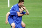 PIGGYBACK: Ryan Tinsley enjoys a ride on the back of Andy Bevin after a goal. PHOTO/FILE PIGGYBACK: Ryan Tinsley enjoys a ride on the back of Andy Bevin after a goal. PHOTO/FILE