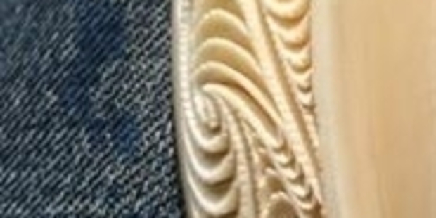 TREASURE: The taonga (treasure) carved by Rangi Kipa and worn by New Zealand Commonwealth Games flagbearer Valerie Adams during the Commonwealth Games opening ceremony.