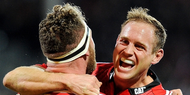 Crusaders Kieran Read and Andy Ellis celebrate the semifinal victory over the Sharks. Photo / Getty Images