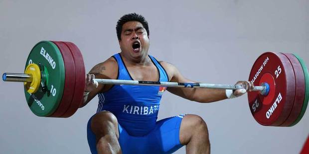 David Katoatau of Kiribati drops the bar during the Men's Weighlifting 75kg Group A Final. Photo / Getty Images.