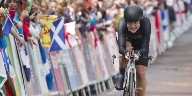 Linda Villumsen crosses the finish line the Women's Time Trial to claim gold. Photo / Greg Bowker