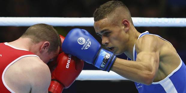 New Zealand's David Nyika (in blue) in action against Sean McGlinchy of Northen Ireland during the men's light heavy 81kg semifinal. Photo / Getty Images