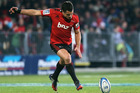 Dan Carter's calm presence was crucial for the Crusaders as they set about dismantling the Sharks. Photo / Getty Images