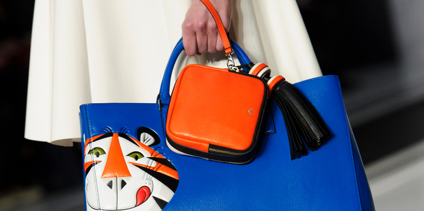A model wears an accessory created by Anya Hindmarch during London Fashion Week Autumn/Winter 2014. Photo / AP Images.