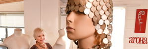 Jo Odgers finalist in the World of wearable art awards. Jo Odgers with the dresss made of 20c coins. Photo/George Novak.