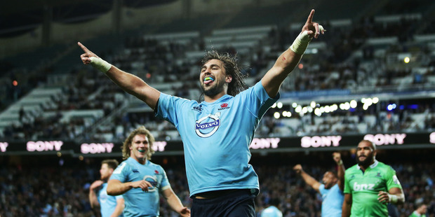 Jacques Potgieter of the Waratahs celebrates scoring a try. Photo / Getty Images