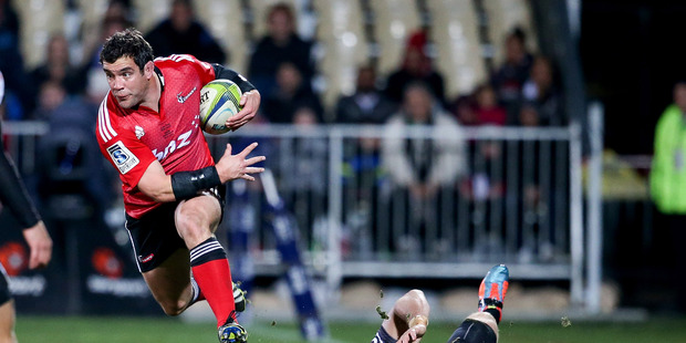 Corey Flynn of the Crusaders jumps out of a tackle during the Super Ruby Semi Final match against the Sharks. Photo / Getty Images