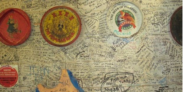 Grafitti on the wall of the Lion's Den Hotel in the north of Queensland. Photo / Graham Reid