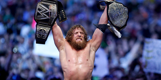 Daniel Bryan celebrating after winning the main event during Wrestlemania. Photo / AP