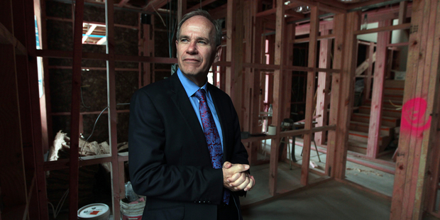 Auckland Mayor Len Brown wants to contain up to 70 per cent of urban growth within existing boundaries. Photo / Doug Sherring