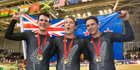 New Zealand men's sprint team of Sam Webster, Ethan Mitchell and Eddie Dawkins celebrate their gold medal. Photo Greg Bowker