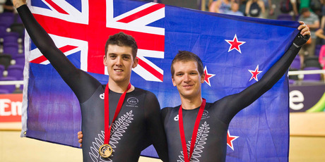 New Zealand riders Thomas Scully and Aaron Gate celebrate with gold and bronze medals. Photo / Greg Bowker
