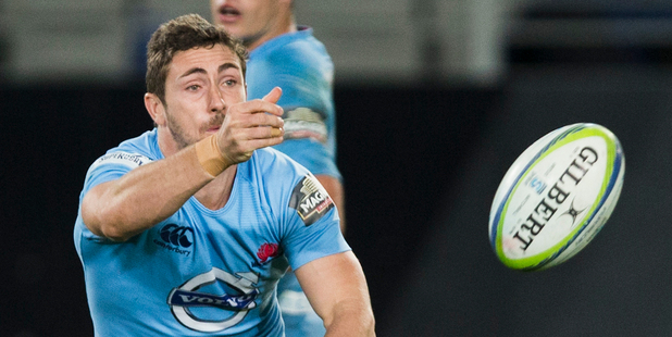 Waratahs halfback Nick Phipps delivered quality cover tackles. Photo / Greg Bowker