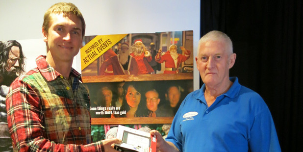 Writer and director of The Z-Nail Gang, Anton Steel, delivers a copy of the movie to Te Puke Capitol Theatre owner operator Ross Trebilco ahead of tonight's premiere.