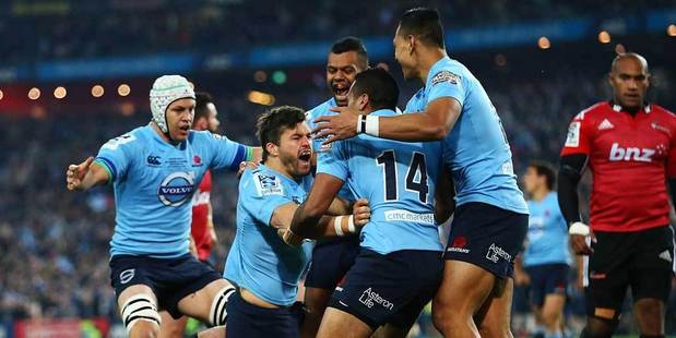 The Waratahs celebrate a try by Adam Ashley-Cooper during the Super Rugby Grand Final match between the Waratahs and the Crusaders at ANZ Stadium. Photo / Getty Images.