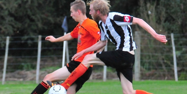 ON FIRE: Tom Woodcock, flying high with two goals for Douglas Villa in an upset win over Western Suburbs. PHOTO/FILE