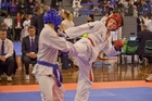 Taekwondo national championships at the Queen Elizabeth Centre over the weekend, including this one between James Wood (red) and Harry Head. Photo / Andrew Warner Taekwondo national championships at the Queen Elizabeth Centre over the weekend, including this one between James Wood (red) and Harry Head. Photo / Andrew Warner