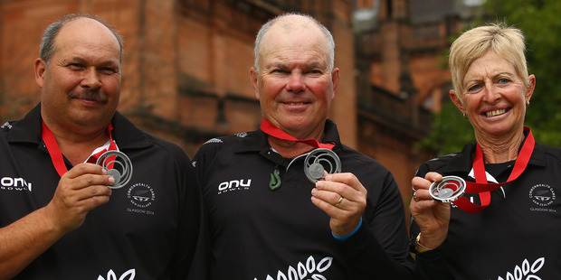 The Kiwi trio of Barry Wynks, Mark Noble and Lynda Bennett collected New Zealand's third medal on Glasgow's greens. Photo / Getty