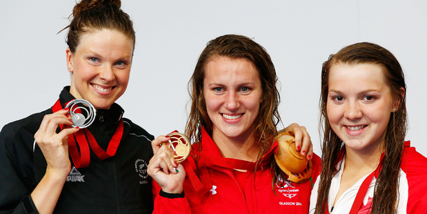 Silver medallist Lauren Boyle, left, with gold medallist Jazz Carlin of Wales and bronze medallist Brittany Maclean of Canada. Photo / Getty Images