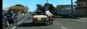 Car 'surfing' caught on camera